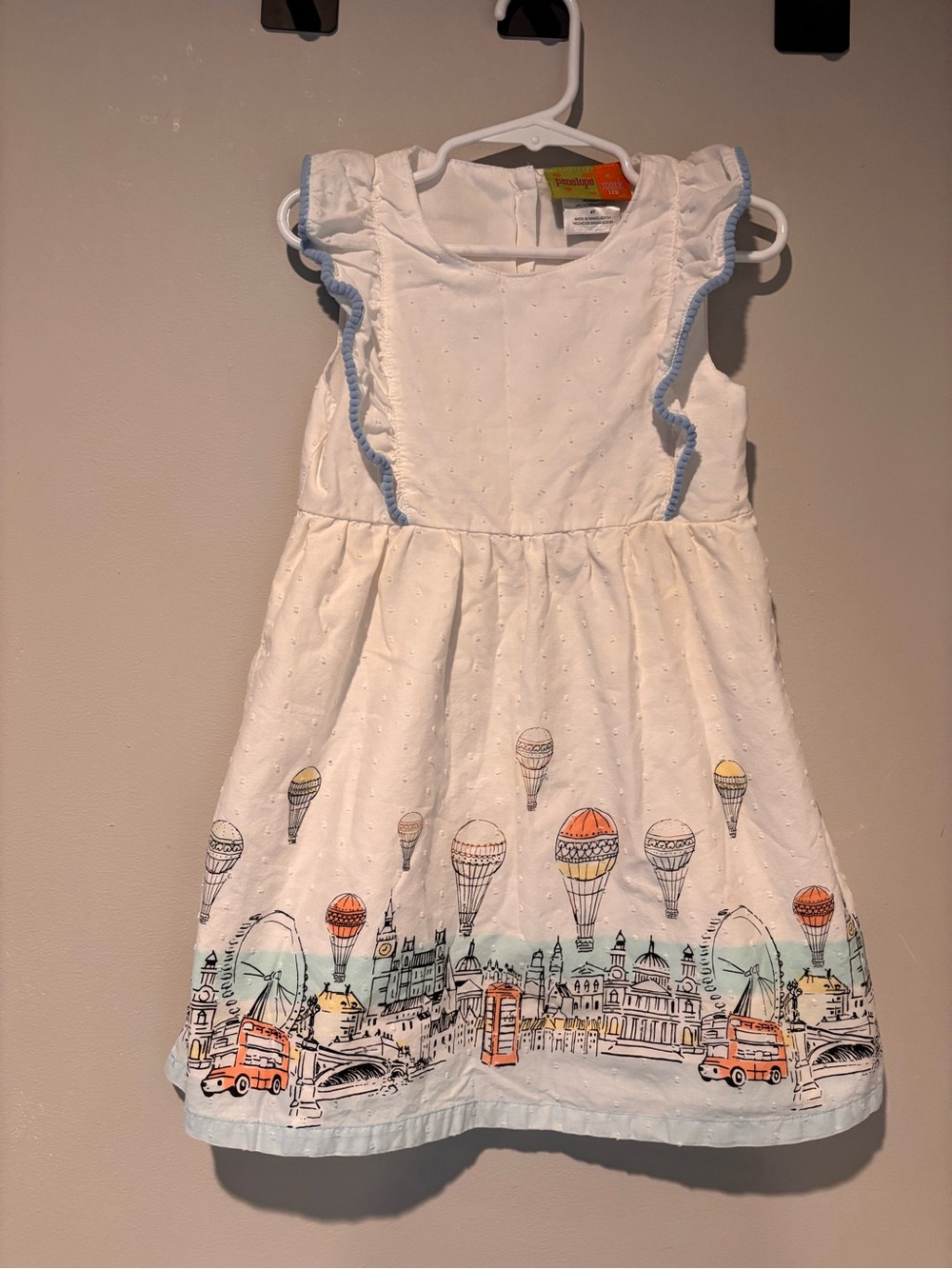 Penelope Mack White Dress with Blue Trim and Multicolor Hot Air Balloon Border